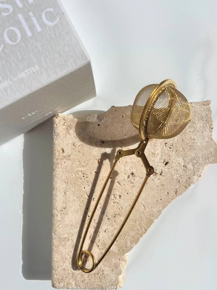 gold mesh tea infuser. for wholesale by cle. naturals
