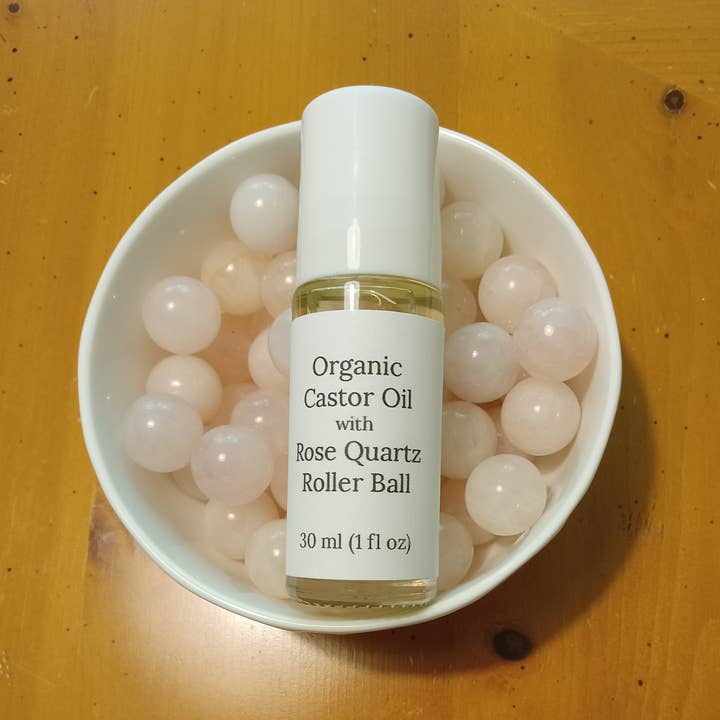 Organic Castor oil with rose quartz roller ball 30 ml 1 oz for wholesale by Mnemosyne's Gems