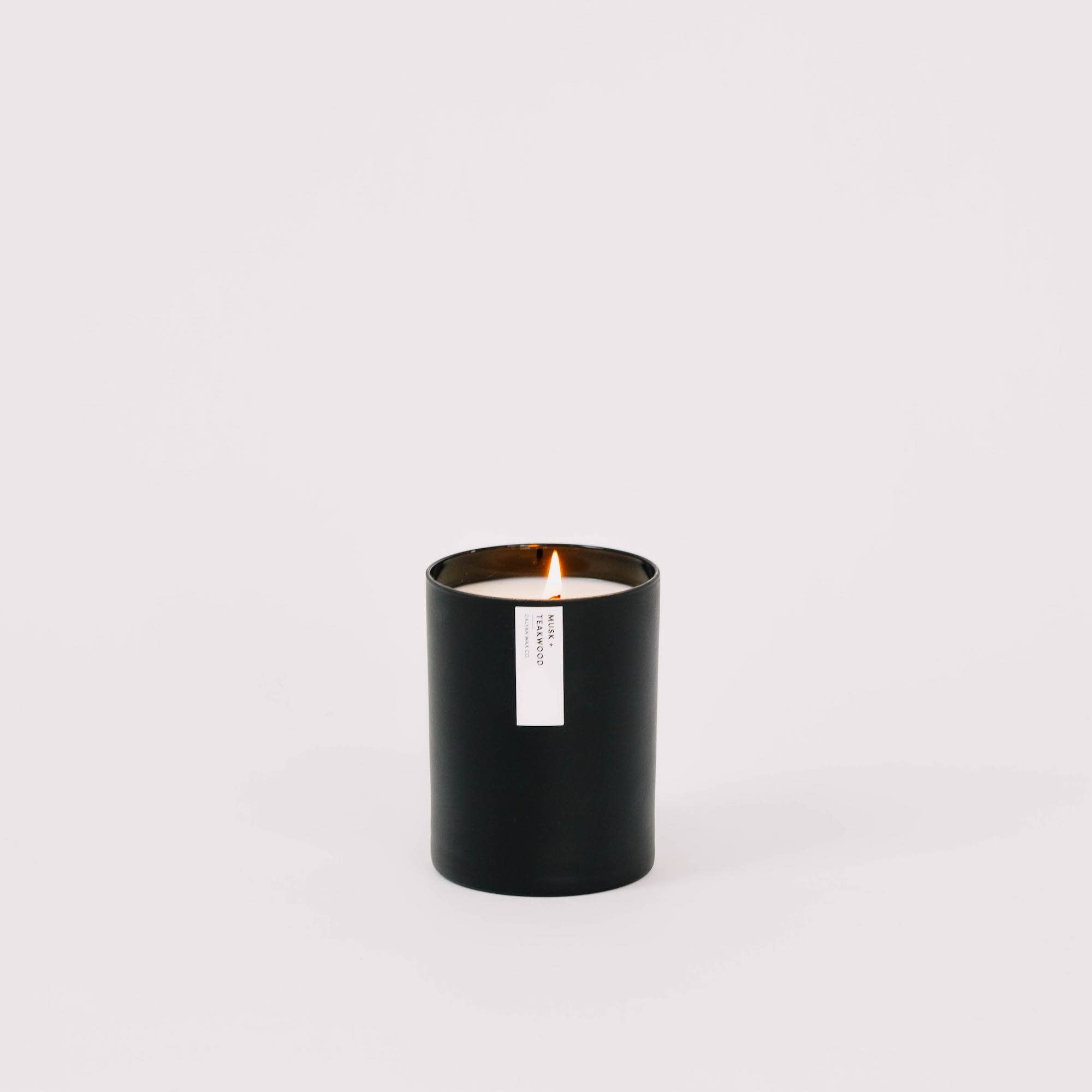 Calyan Wax Co. - Wholesale Jar/Filled Candle - Musk + Teakwood - Matte Black Tumbler Soy Candle3
