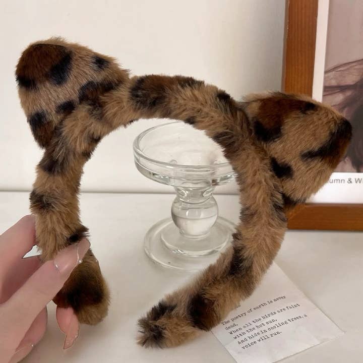 marrone Cerchietto per orecchie di gatto in pelliccia sintetica leopardata ST5 in vendita all'ingrosso su Faire