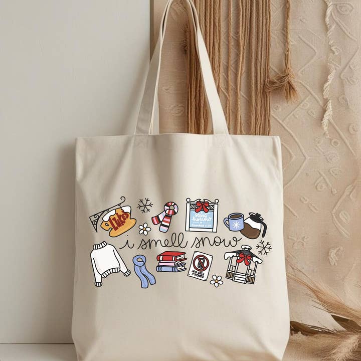 Gilmore Girls I Smell Snow Tote Bag for wholesale by Nearly June Design Co