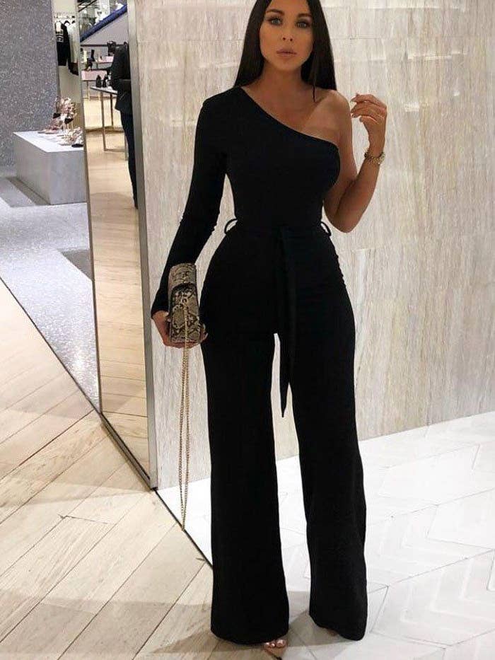 Black Belted One Shoulder Jumpsuit - Evelyn for wholesale by Femme Luxe
