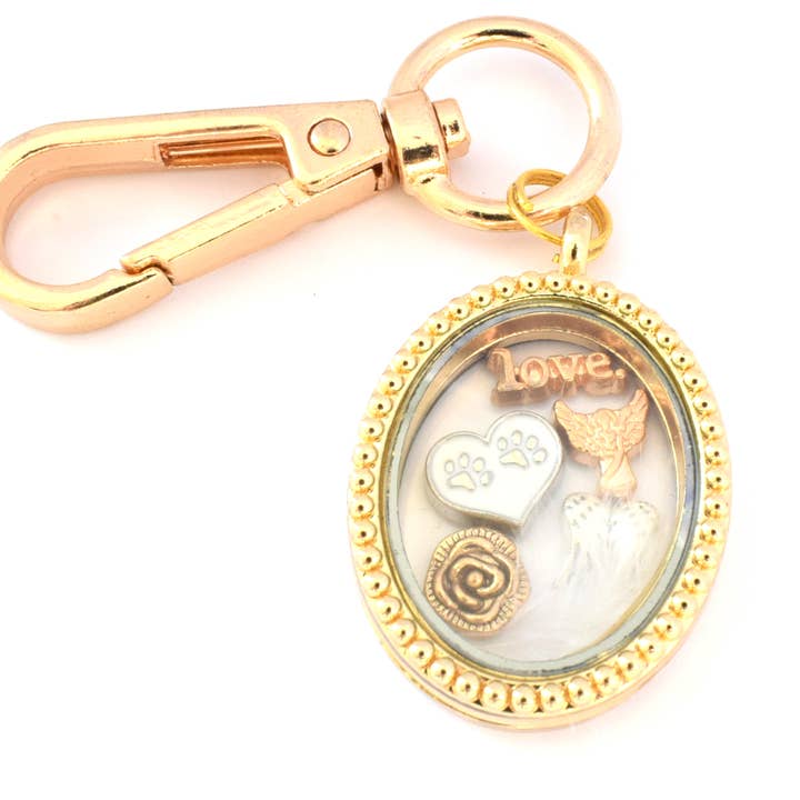 Paw Memorial Gold Oval Floating Locket Keyring (or necklace) for wholesale by Amaya Rose Ltd.