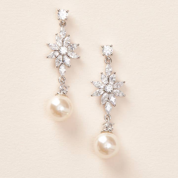 Amina Pearl Earrings and other Purchase Wholesale amina. Free Returns & Net 60 Terms on Faire trending on Faire.