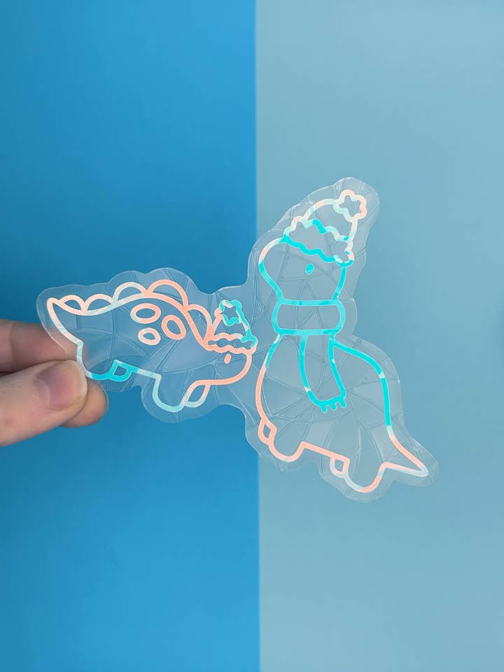 Attrape-soleil Dinos d'hiver pour la vente par Poppodopolis