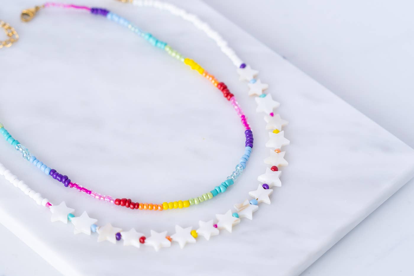 Goupi – wholesale Beaded/pearl necklace – Rainbow Choker and Star Multi Color Necklaces0