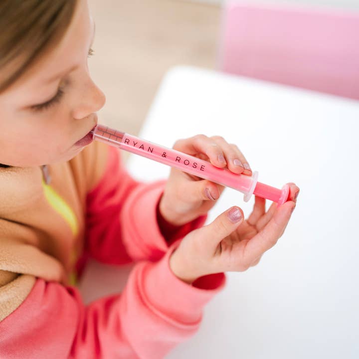 Lollipop Cutie Dose (oral liquid dispenser) for wholesale on Faire
