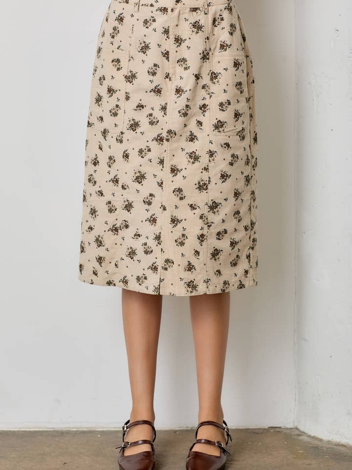 JUPE LONGUE À IMPRIMÉ FLORAL pour la vente par Polagram by Wellmade USA