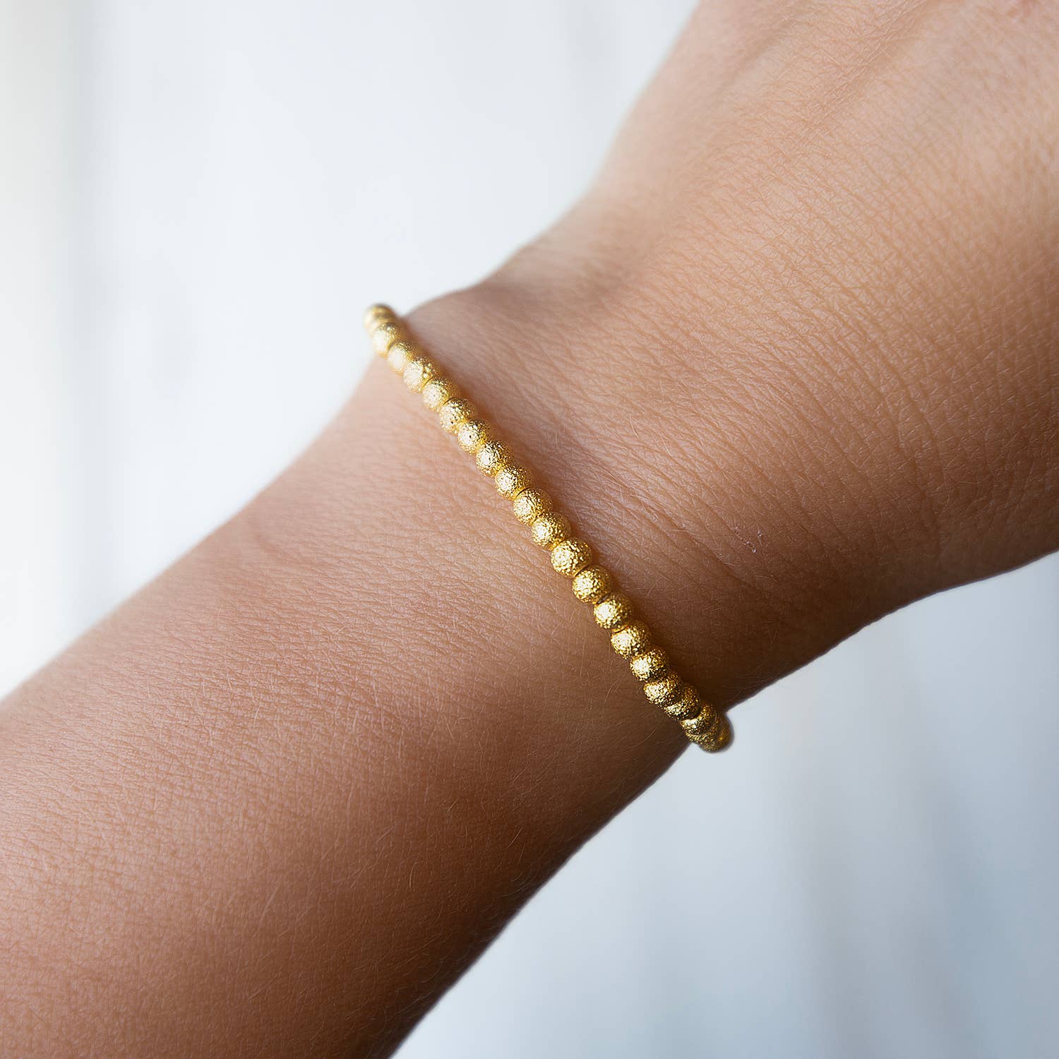 Lenny & Eva – wholesale Beaded bracelet – Gold Beaded Bracelets-4mm, Textured, Stretch, Long Wear3