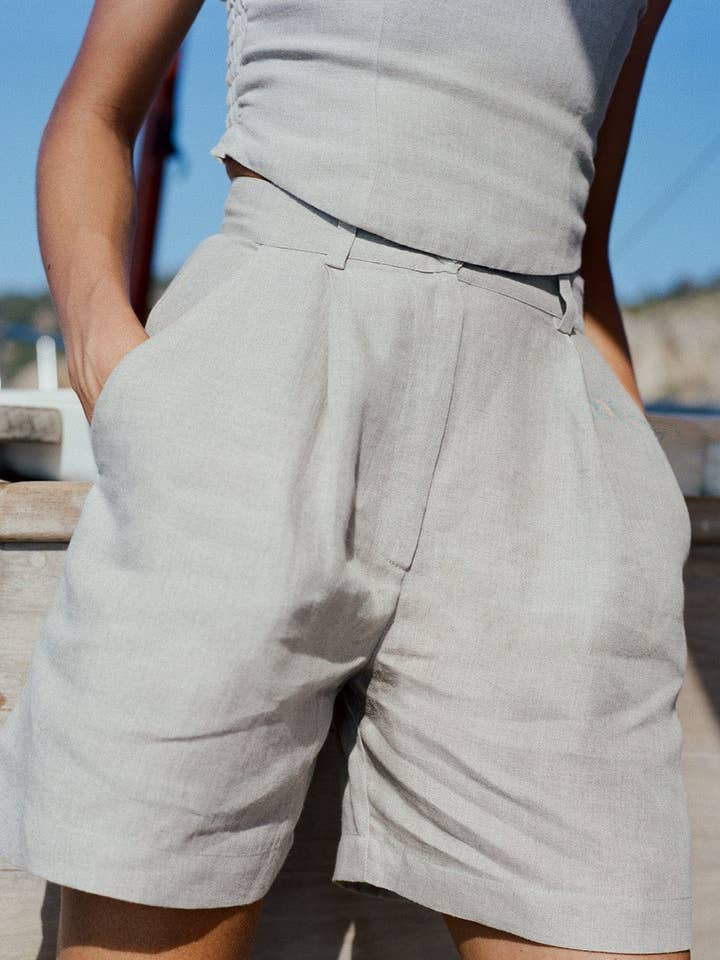 The Sienna Pleated Shorts in oatmeal for wholesale by arkitaip