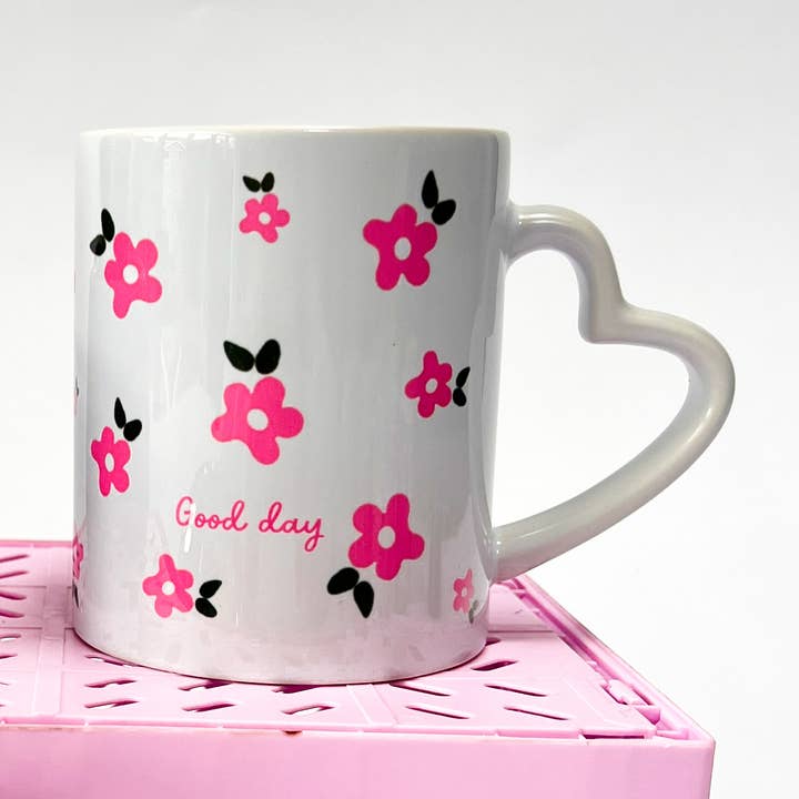 Pink good day mug for wholesale by Howrad Studios