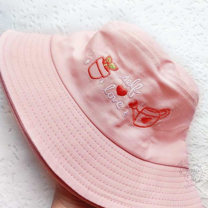 Self Love | Pink Bucket Hat for wholesale by squibblefu