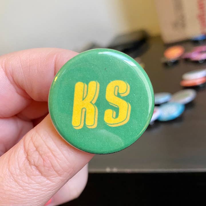 Lil Boat Boutique - Wholesale Lapel Pin/Button - Kansas State Initials 1.25" Button KS Pin Back