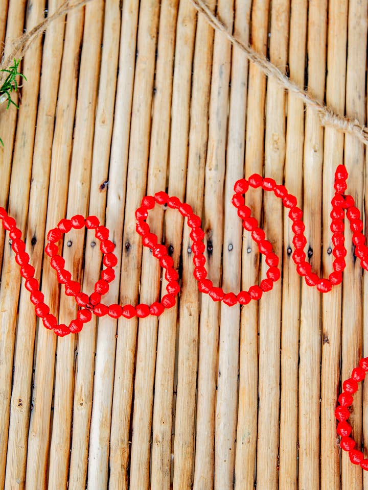 Merry Paper Bead Wall Hanging for wholesale by Grain of Rice Project