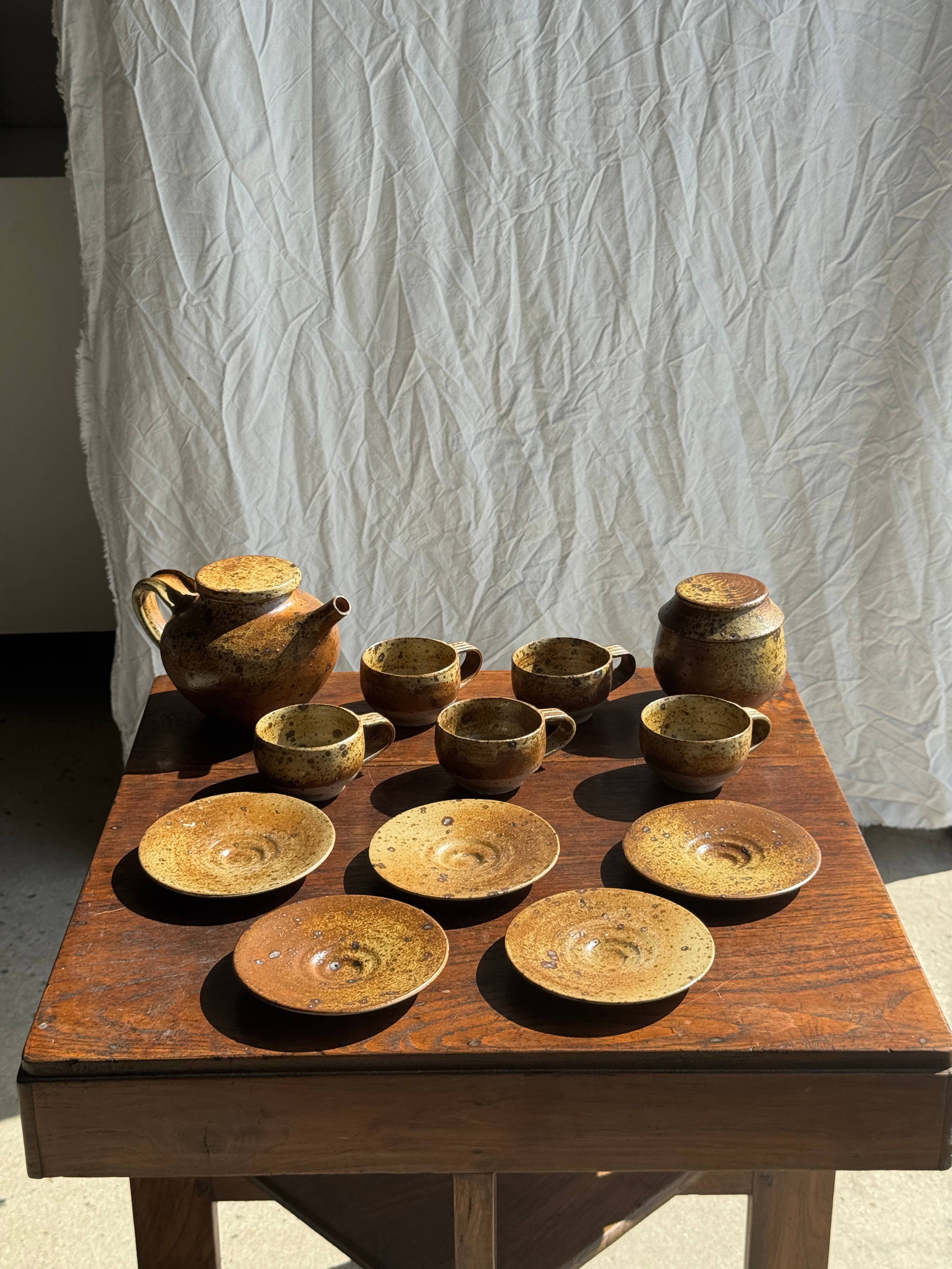 brown Small stoneware tea set with teapot, cups, sugar bowl for wholesale on Faire2