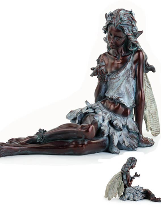 Figurine, Fairy Holding Bird Item #13458 for wholesale by Napco