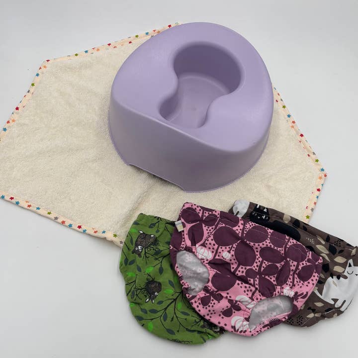 Ekologiska babybyxor i rosa och lila med blommiga djurmotiv för wholesale av Ecopitchoun