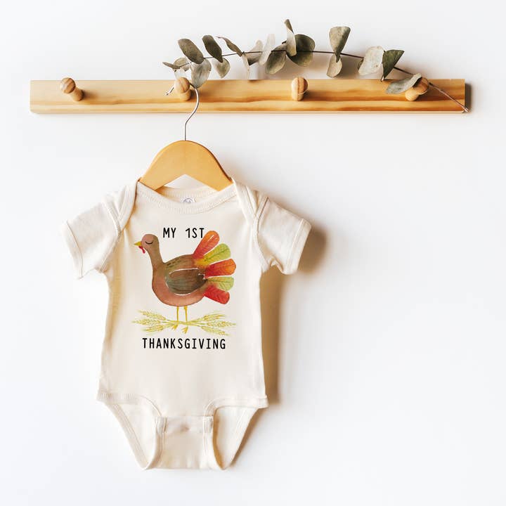 Happy 1st Thanksgiving Natural Color Baby Bodysuit for wholesale by Love You a Latte Shop