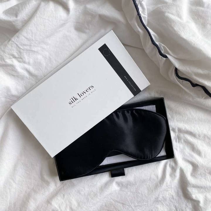 Negro Antifaz para dormir 100% seda con relleno de seda para hombre 6 de venta al por mayor en Faire