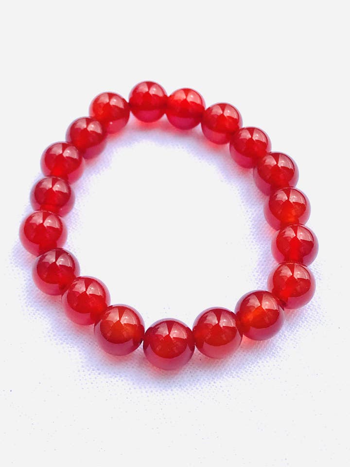 Carneool 10 mm ronde tuimelstenen armbanden voor wholesale door Crystal Universe