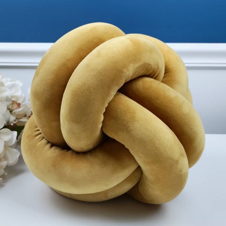 Knot Pillow in Ball shape is 12 inches for wholesale by SUF Products LLC