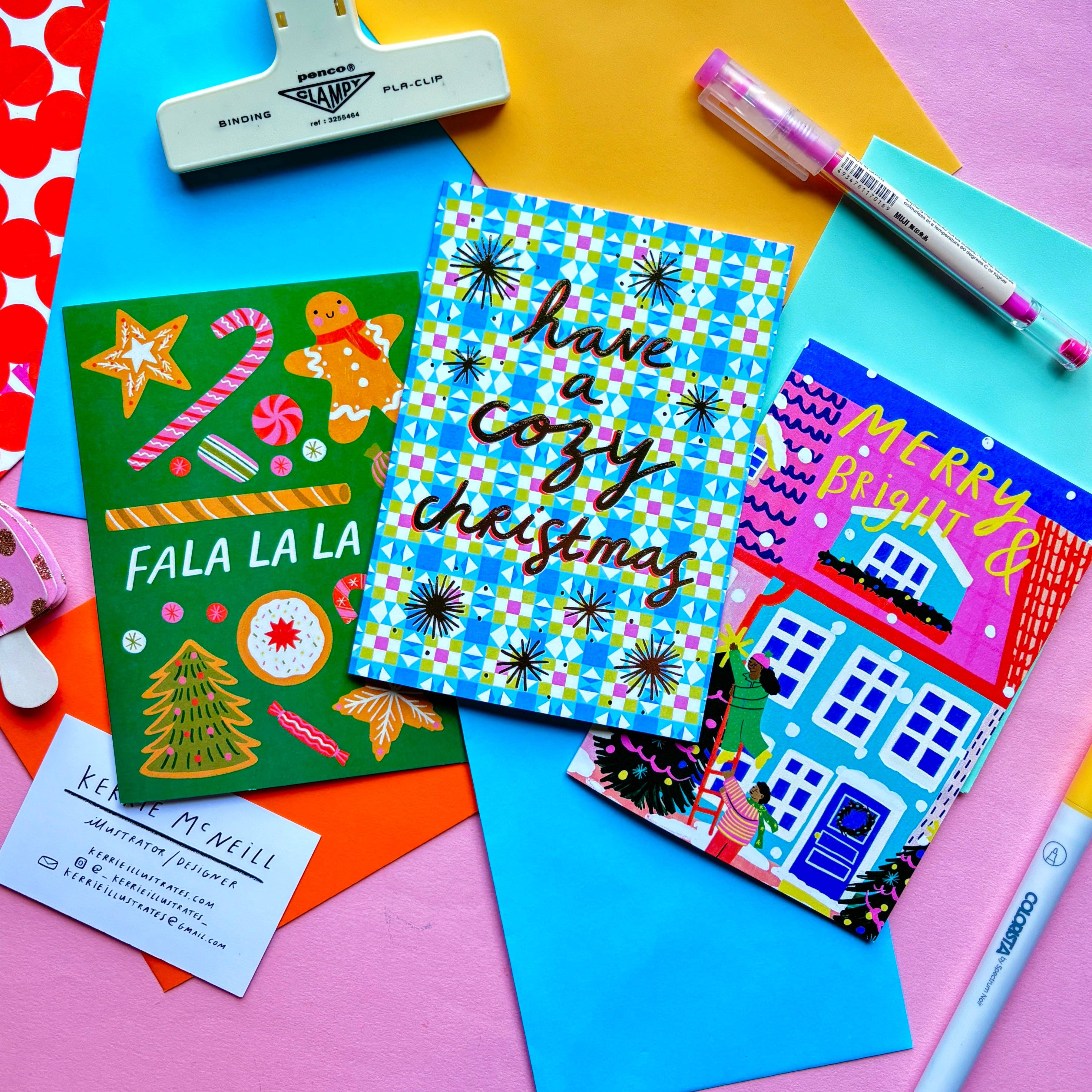 Kerrie Illustrates - Wholesale Christmas Card - Warm Wishes This Christmas Greeting Card | Fireplace Xmas Festive Greetings Cat Cozy Pink Gold Foil3