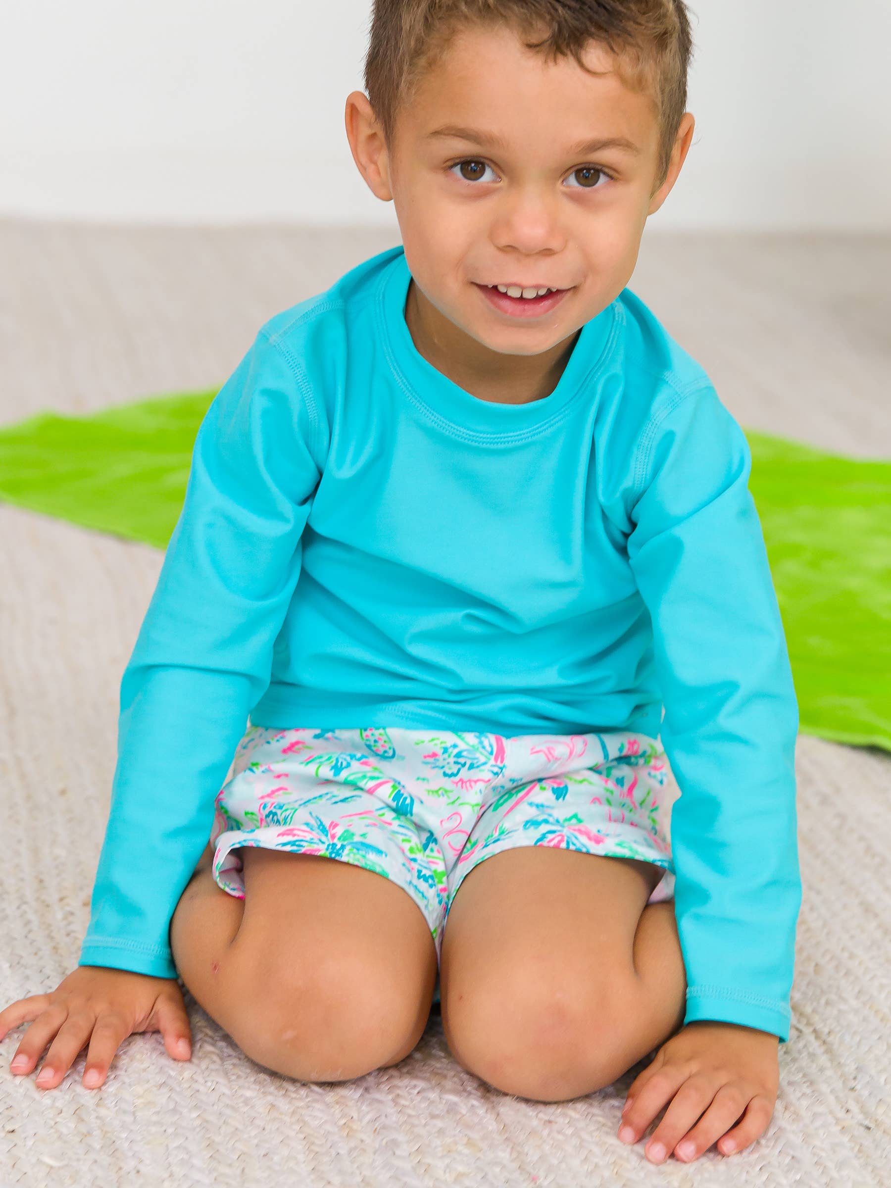 Blue Boys Bright Aqua Long Sleeve Rash Guard for wholesale on Faire10