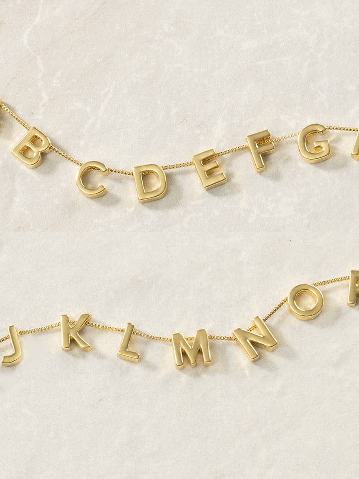 Gold Alphabet Slides and other Purchase Wholesale custom slides. Free Returns & Net 60 Terms on Faire trending on Faire.