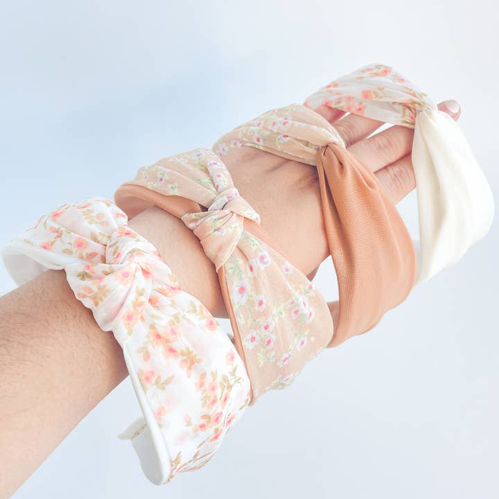 Peach Floral Printed Knot and Twist Headband for wholesale by Adorro
