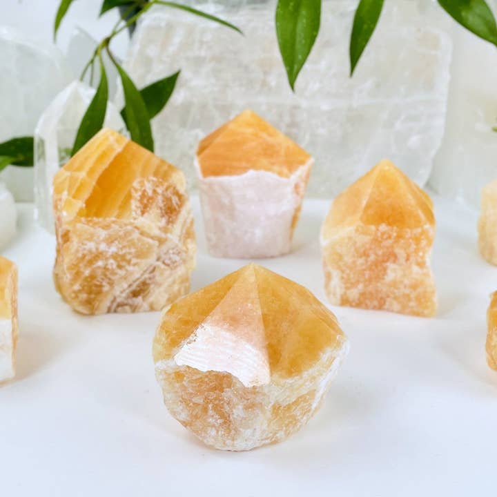 Crystal Orange Calcite Semi-polished Points by Weight for wholesale by Rock Paradise