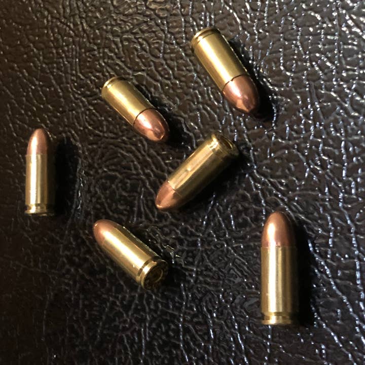 6 Pack of Real 9MM Bullet Fridge Magnets for wholesale by MB Designs