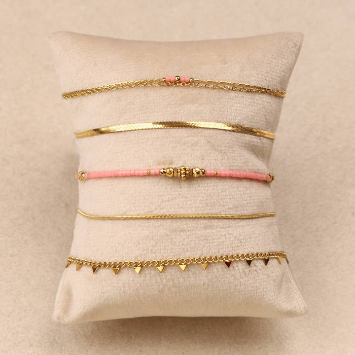 Set aus 10 Armbändern aus Stahl (rosa) für den Großhandel von Les Cleias