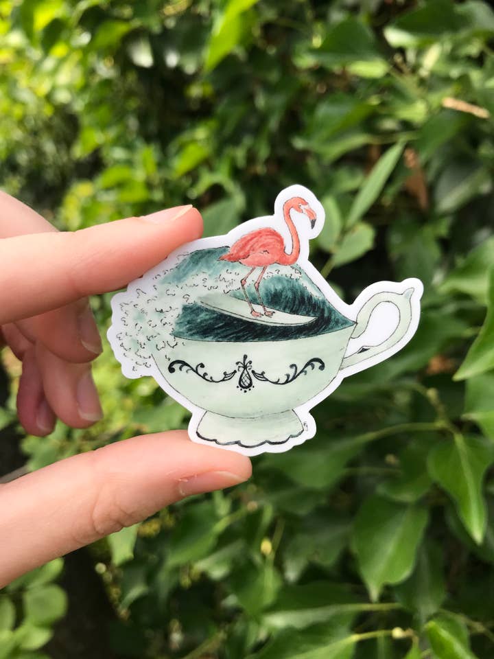 Surfing Flamingo in a Teacup Sticker for wholesale by Lizzy Gass