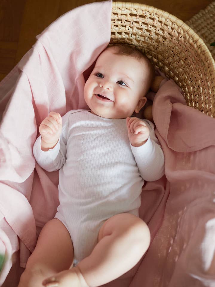 Misty Pink Muslin Swaddle for wholesale by Milk & Honey Brand