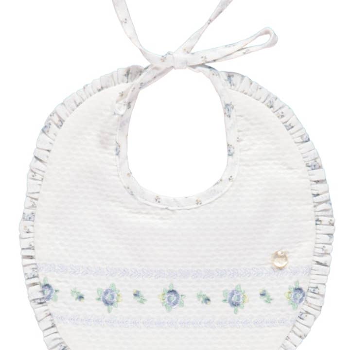 White bib with blue embroidery for wholesale on Faire0