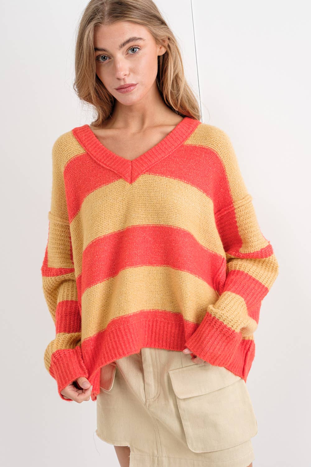 ARANCIO/TORTORA MAGLIONE DOLMAN OVERSIZE A RIGHE CON SCOLLO A V in vendita all'ingrosso su Faire4