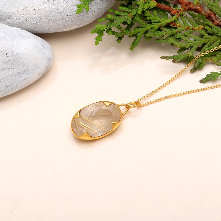 Golden Rutile Long Oval Faceted Pendent for wholesale by K D Jewels