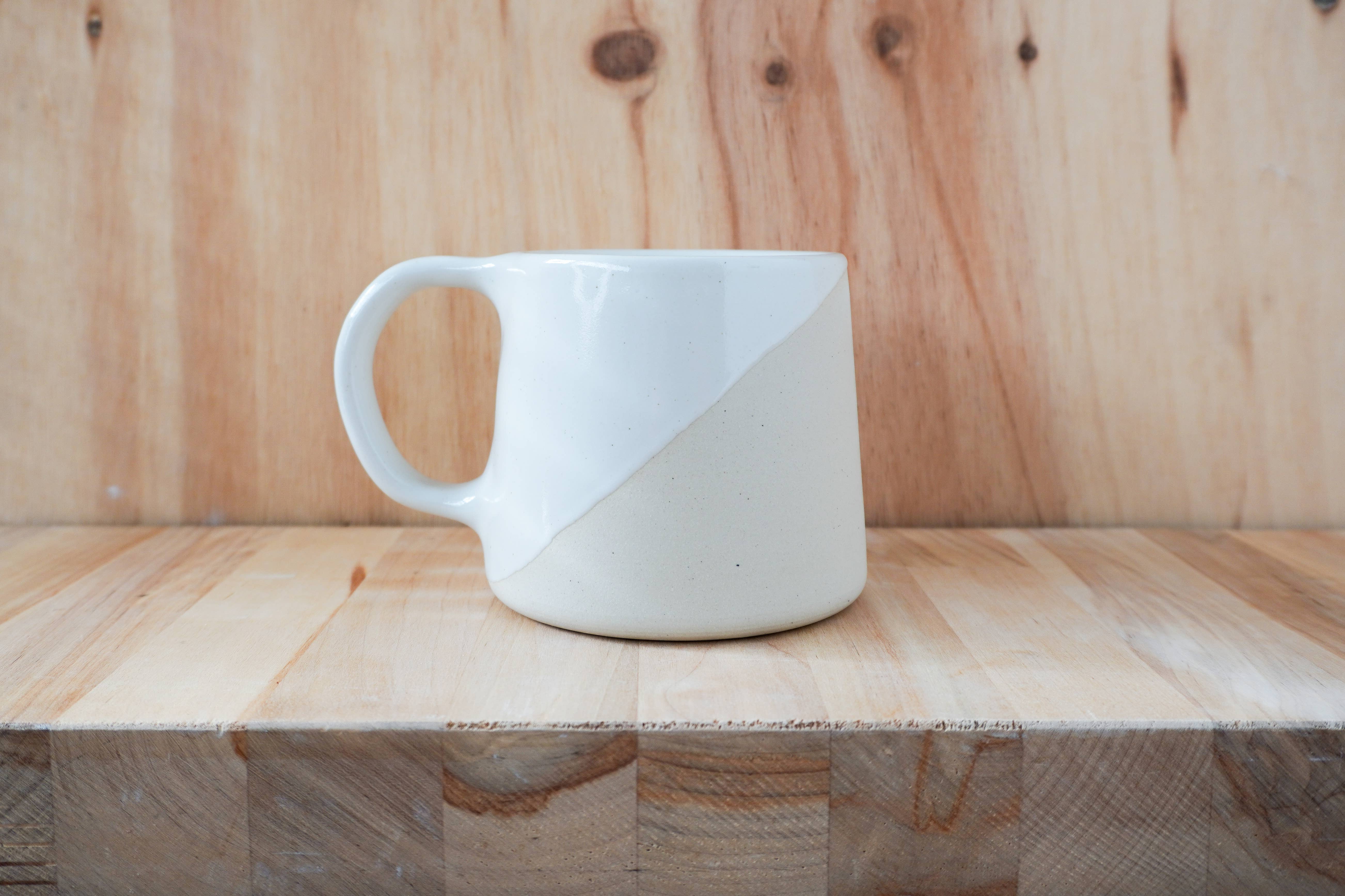 Shelby Page Ceramics - Wholesale Coffee Mug - Classic Taper Mug - Angle Dip0