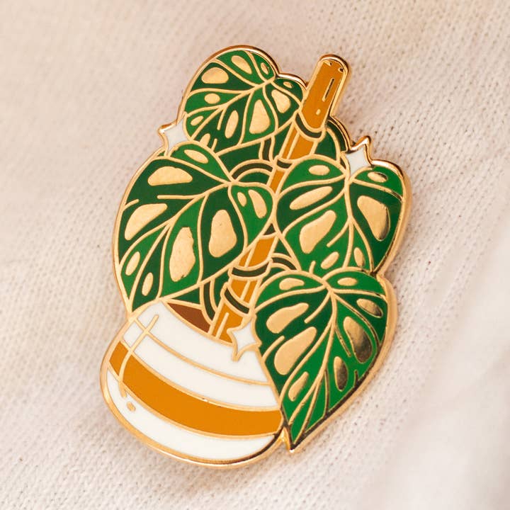 Swiss Cheese Plant Enamel Pin for wholesale by Occasionalish