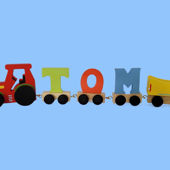 Ryan Town Toys & Gifts - Venta al por mayor Juguete de madera - Niños - Remolque de tractor de madera de color amarillo, juguete con nombre para niños