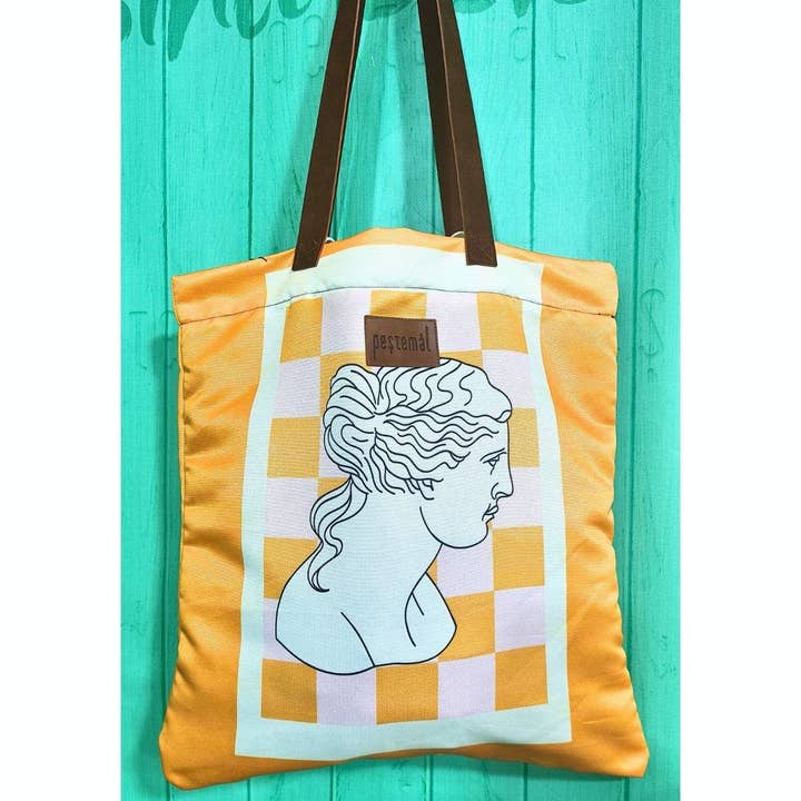 Statue Orange Tote Bag for wholesale by Pestemal