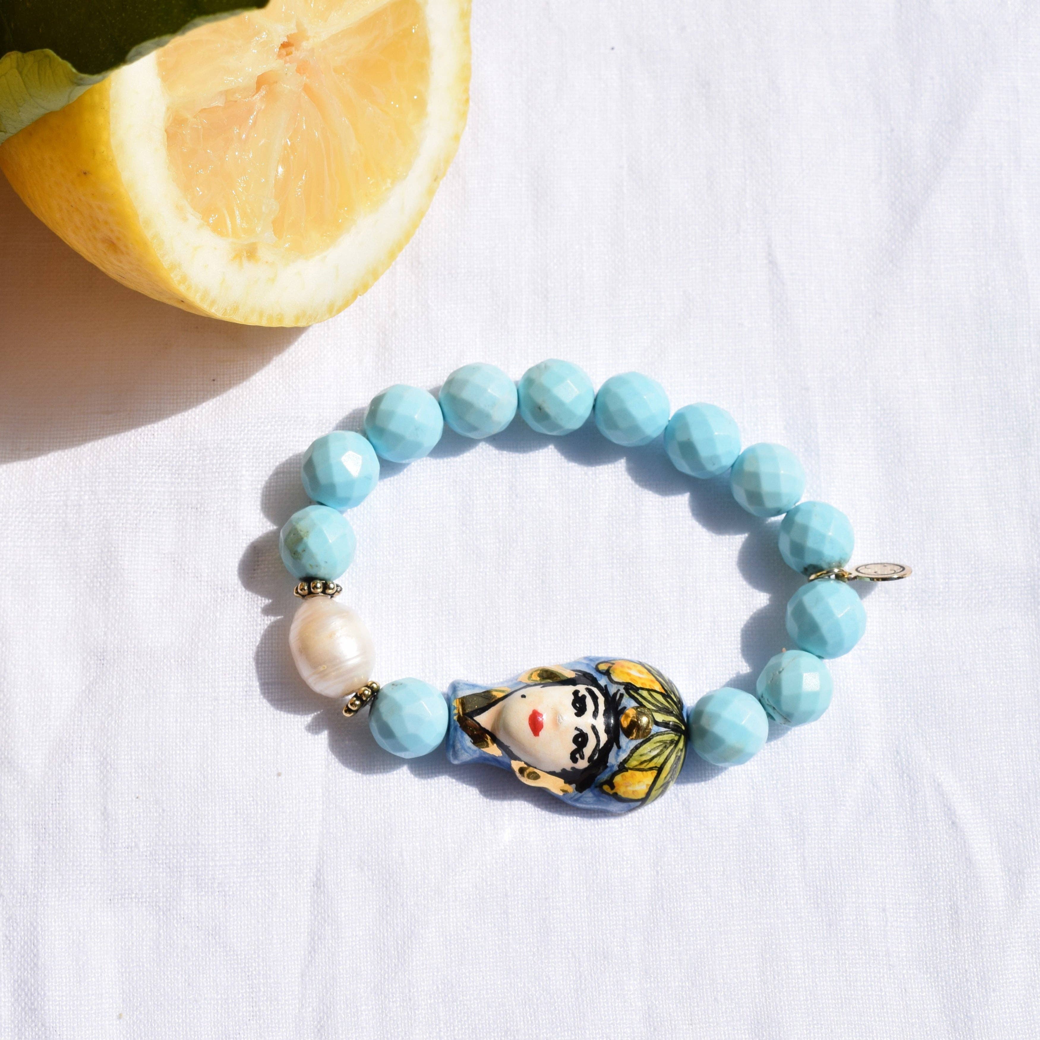 Oriana Lamarca Designs - Wholesale Charm/Dangle Bracelet - Light Turquoise Magnesite with Handpainted Ceramic Testa Di Moro0
