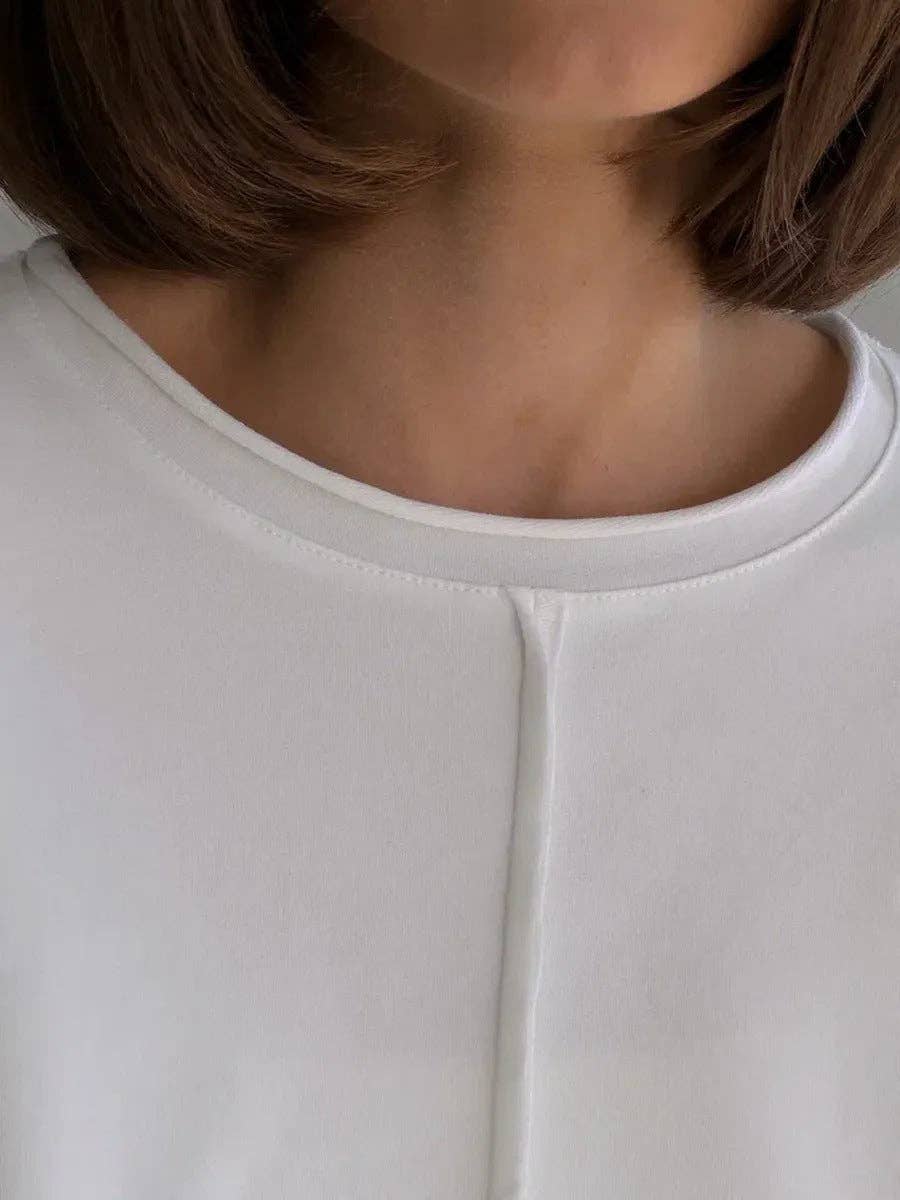 Suhkasana – wholesale T-shirt (utan tryck) – Dam – Avslappnad löst sittande bomullströja med långa ärmar och slitna detaljer.2