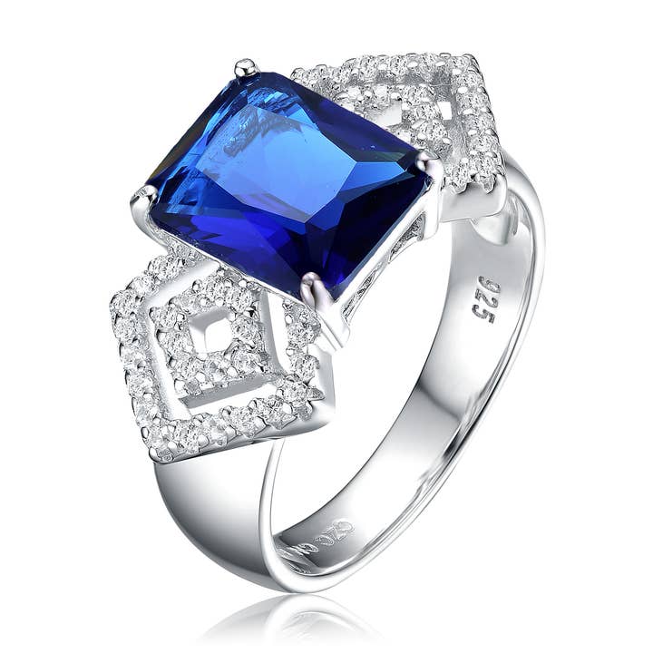 ANEL CZ E SAFIRA (8992-S-7) por atacado de Genevive