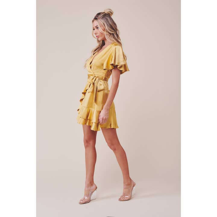 MUSTARD SATIN SHORT FLUTTER SLEEVED FAUX WRAP MINI DRESS for wholesale on Faire