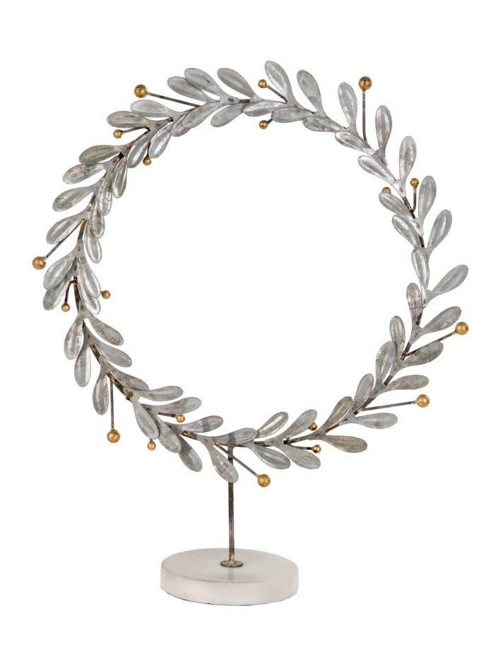 Silver And Gold Wreath on White Marble Stand for wholesale by Flair Interiors
