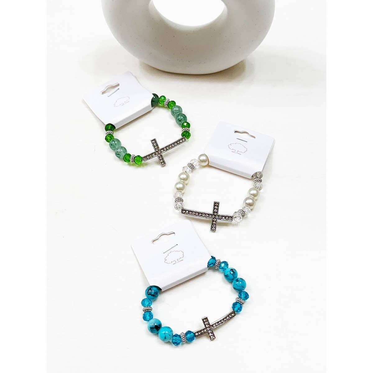 MÉLANGER LA COULEUR Bracelet en perles multicolores avec croix en strass en vente sur Faire1