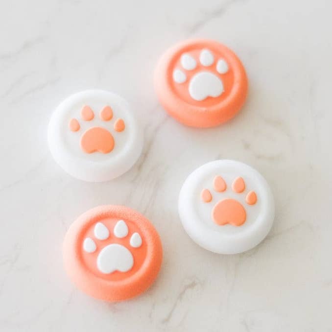 Orange Swirl Paw Controller Tumgrepp för wholesale av StickieTech