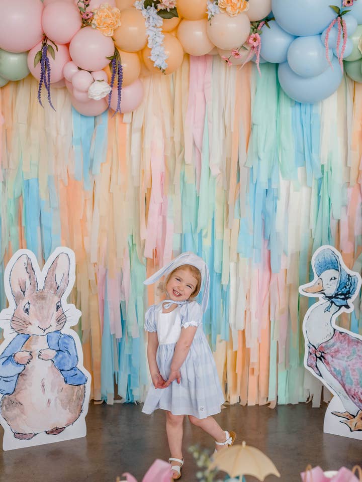 Bunnies & Blooms Fringe Backdrop for wholesale by Oh My Darling Party Co