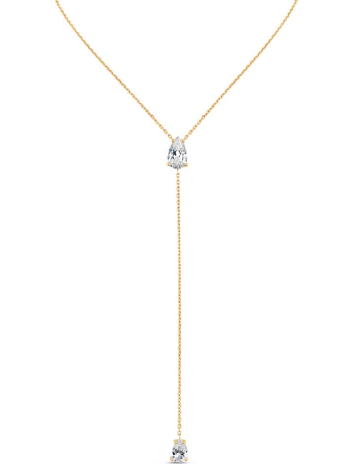 Reines Lariat mit weißen Diamanten in 18K Gold für den Großhandel von SALLY SKOUFIS™
